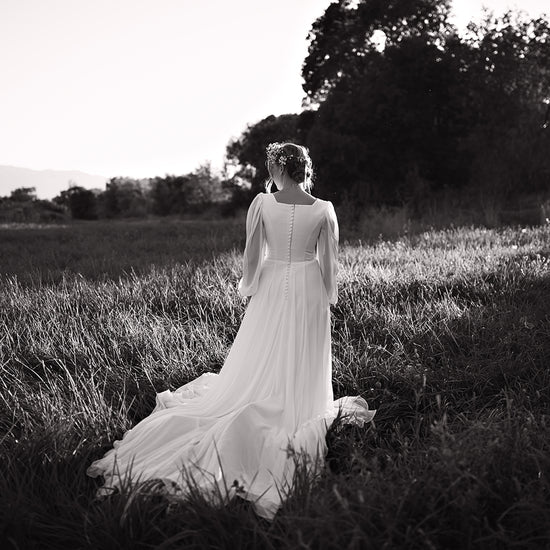 Freebie Lightroom Presets and Lightroom Profiles Free used to edit the image of a bride standing in black and white.