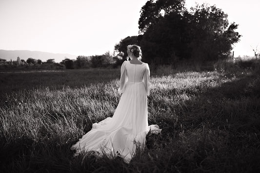 Freebie Lightroom Presets and Lightroom Profiles Free used to edit the image of a bride standing in black and white.