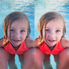 A before and after showing the effects of the Pure Clean Lightroom Mobile Presets.  A girl swimming