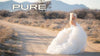 An image of a bride in a fluffy dress walking down a dirt road edited using Pure Lightroom Presets 2 .