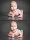A before and after of a young baby on a gray background demonstrating the Pure Retouch Photoshop Technique.  The bottom image has a very smooth background with no lines or blemishes. The skin of the baby has very even tone, but still maintains it's realistic texture.