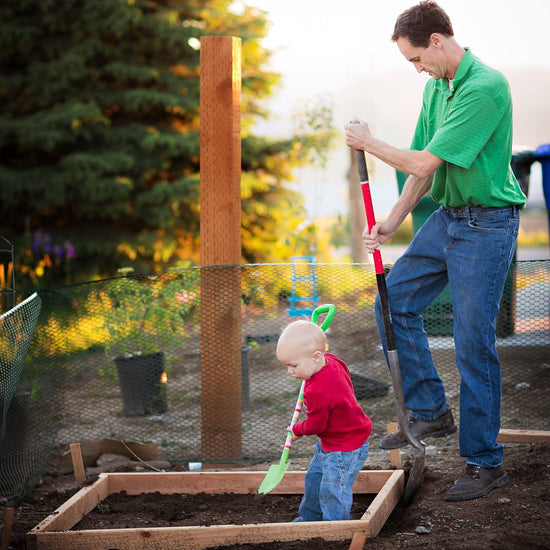 A Father and his son both digging in dirt with shovels, building garden boxes.  The after image has much more pop and contrast and color glows compared to the before action.  Edited with Pure Summer Photoshop Actions and Lightroom Presets.