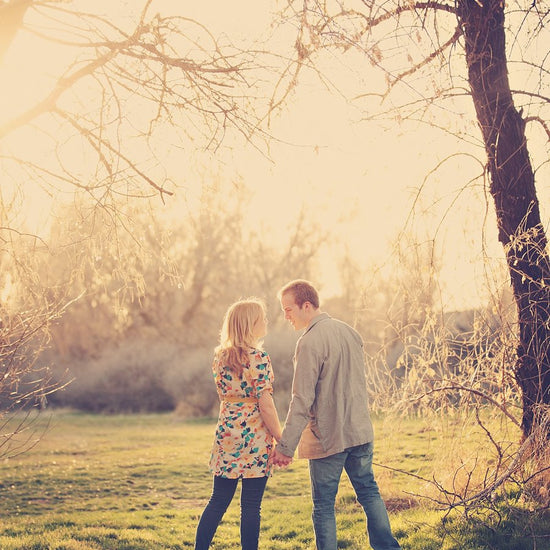 A Vintage toned image of a couple in a dreamy location edited using Purely Vintage Photoshop Actions.