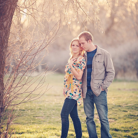 A Vintage toned image of a couple in a dreamy location edited using Purely Vintage Photoshop Actions.