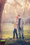 A Vintage toned image of a couple in a dreamy location edited using Purely Vintage Photoshop Actions.