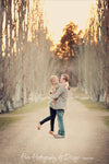 A Vintage toned image of a couple in a dreamy location edited using Purely Vintage Photoshop Actions.